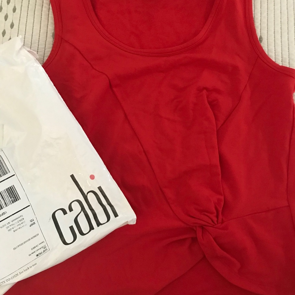 Cabi XS cherry red knotty tee.